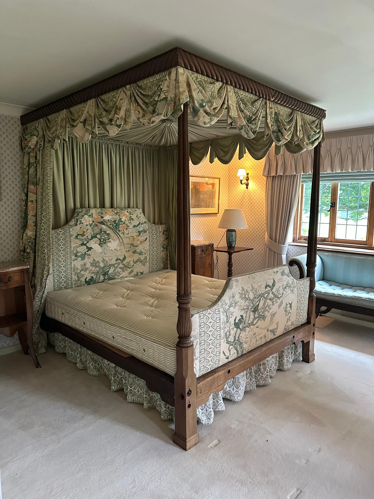 A George III style mahogany four poster bedstead